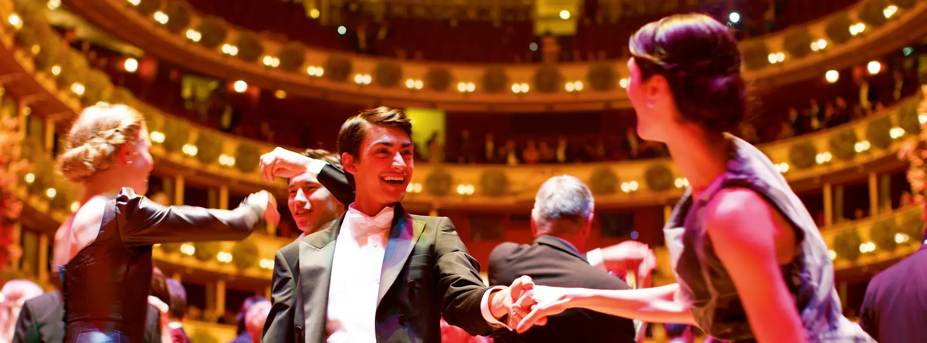 People dancing at the Opera Ball 