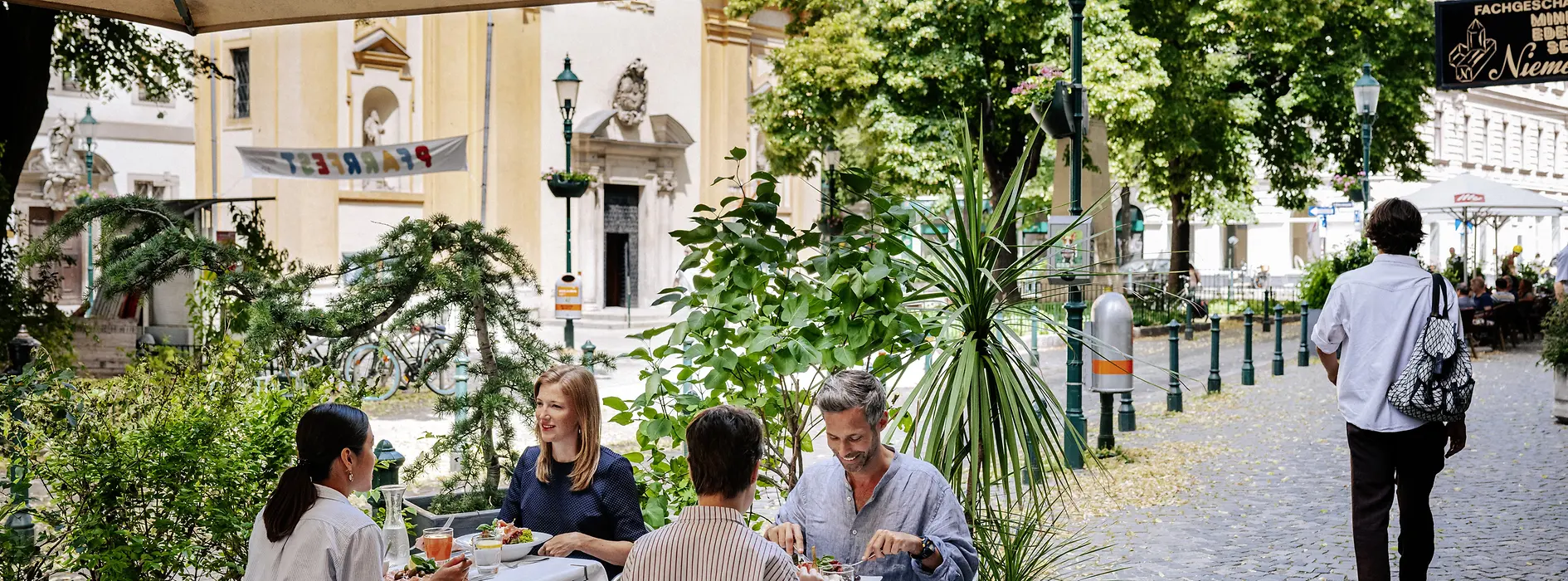 People sitting in an outdoor dining area