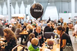 Edelstoff design market, balloon with "Edelstoff" logo