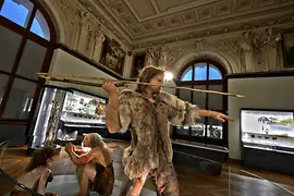 Anthropology hall in the Natural History Museum: Stone Age man with spear and pelt