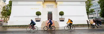 Cyclists in front of the Secession