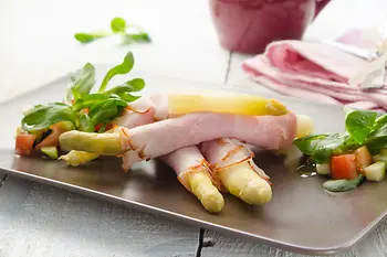 Asparagus dressed in ham