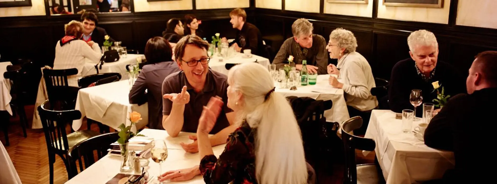 People discussing in a restaurant