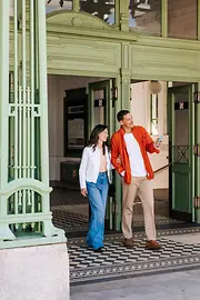 A couple leaving the subway station