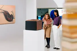 mumok Museum, two women looking at a piece of art