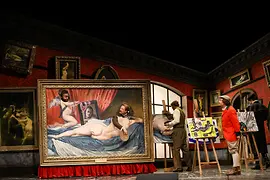 Escena de la ópera de Otto Nicolai "Las alegres comadres de Windsor": pintor en su estudio