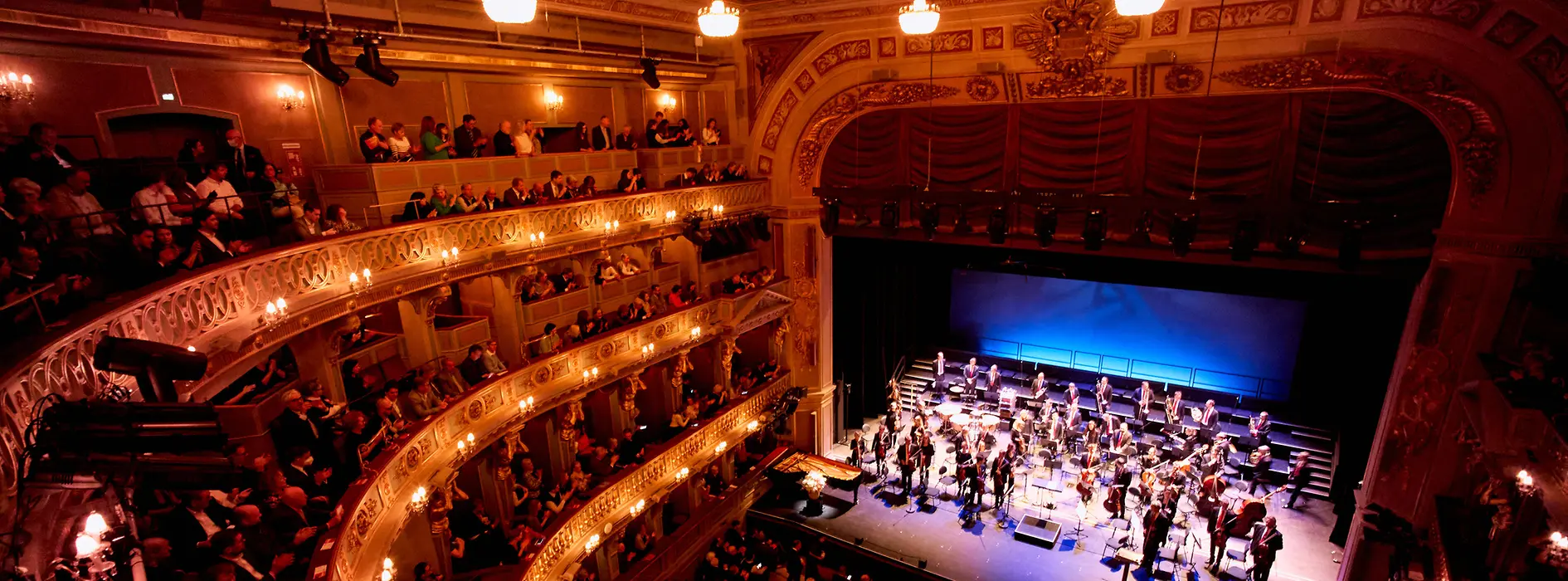 MusikTheater an der Wien at a performance, with audience and musicians on stage